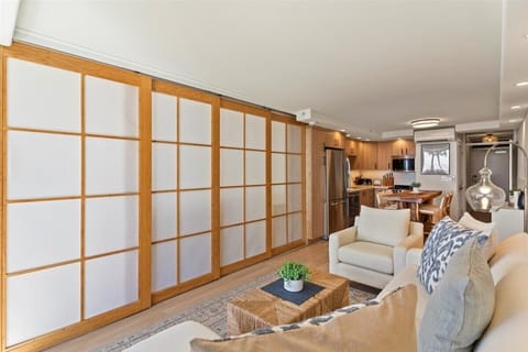 Sliding privacy doors to the primary bedroom