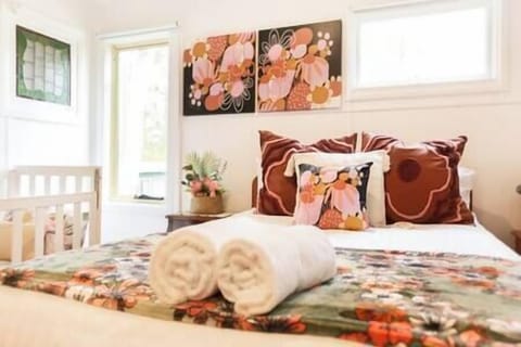 Main bedroom has a double bed + cot