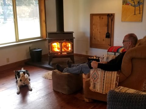 Cup of coffee in front of the fire.