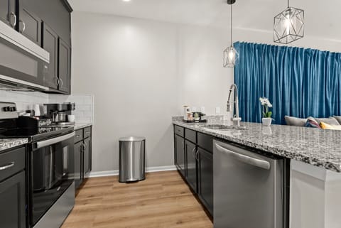 Get your taste buds tingling as you prepare to whip up your favorite dish in our fully equipped kitchen, ready to tantalize your senses