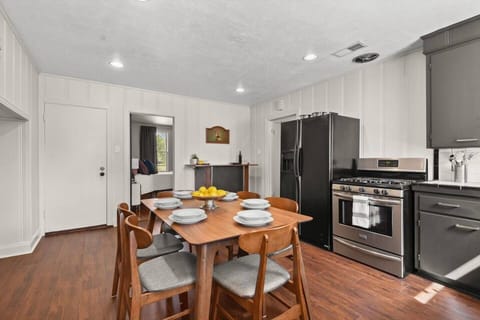 Kitchen with vintage bar area.