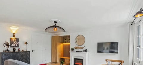 Relax by the fireplace in a bright, modern lounge