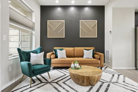 Modern Cozy Living Room - Stylish Sofa, Chic Decor & Vibrant Accent Chair