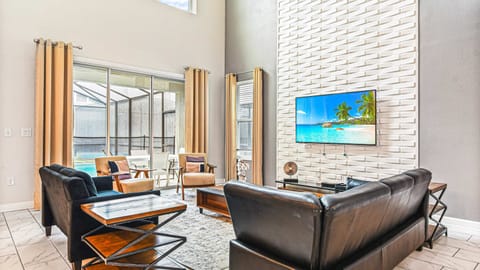 Enjoy quality time with loved ones in our inviting living room, offering a cozy space for relaxation.