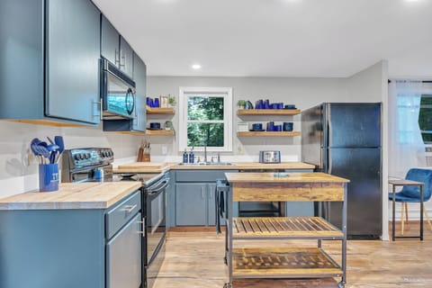 Fully stocked kitchen with everything you need to make a nice meal.