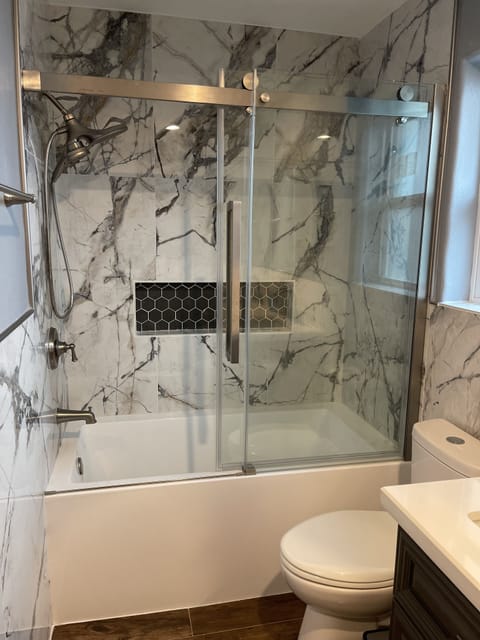 2nd bathroom with shower/tub and double sinks 