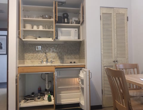 Fridge, microwave, stovetop, coffee/tea maker