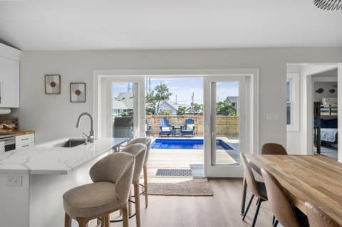 Kitchen Dining opens up to Outdoor Saltwater Plunge Pool