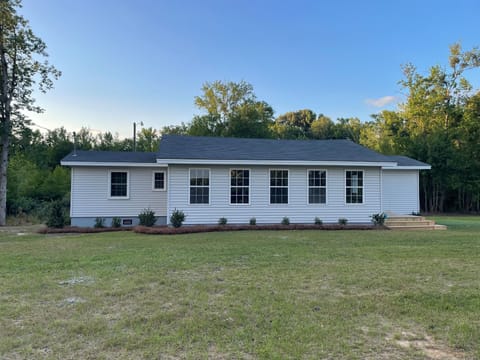 Front of house. Have added gutters and driveway since this picture.