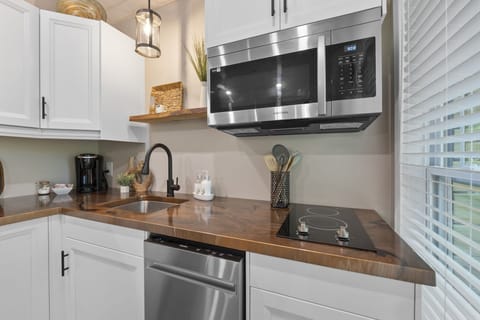 Microwave, dishwasher & Keurig coffee maker. We provide coffee, creamer & sugar.