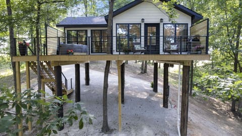 The front of the treehouse. All of the windows face the water view..