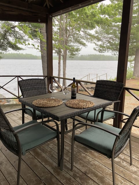 Dining area on screened in porch.