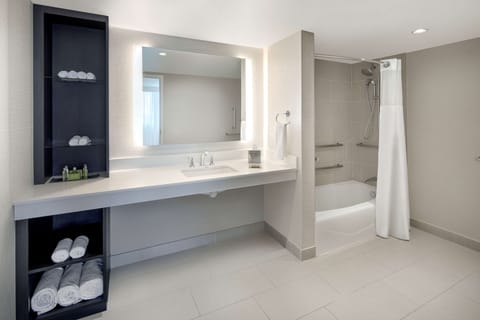 Suite, 1 King Bed, Non Smoking | Bathroom | Designer toiletries, hair dryer, towels