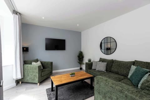 Stretch out on the oversized corner sofa or sink into the snug armchair — this lounge was made for movie nights, lazy mornings, and everything in between