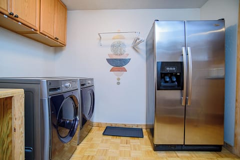Extra refrigerator for large families or groups and laundry machines provided