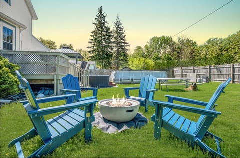 Settle into the backyard as the kids run free in the fenced yard and the grown ups unwind by the fire pit.