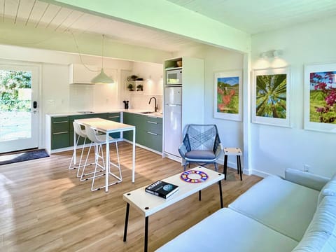 Bright, open living space with kitchen and comfy lounge - your private retreat.
