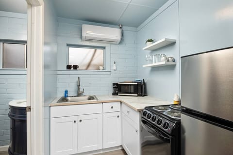 Cook delicious meals for breakfast, lunch, and dinner in this fully equipped kitchen. We suggest grabbing some seafood from a local market.