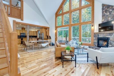 Relax in the living room in front of a cozy fire, while watching your favorite shows, movies, and sports!