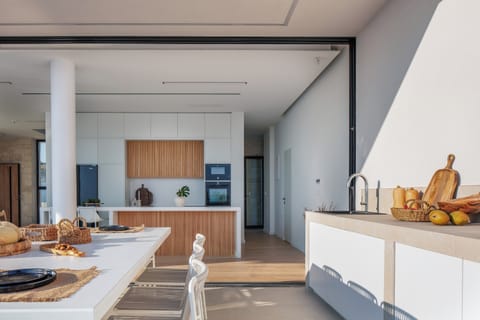 The single-line kitchen is located on the ground floor