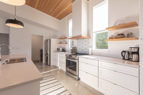 Fully stocked bright kitchen