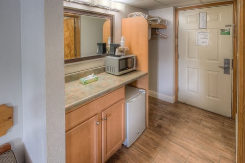 Deluxe Room, 2 Queen Beds, Pool View | Desk, laptop workspace, blackout drapes, iron/ironing board