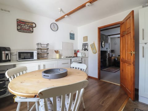 Fridge, electric kettle, toaster, cookware/dishes/utensils