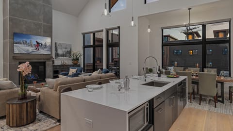 Kitchen, Main Level - Looking into great room and deck access