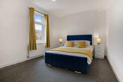 Bedroom 1 offers flexibility and comfort with a cosy double bed, ensuring a restful retreat for a peaceful night's sleep.