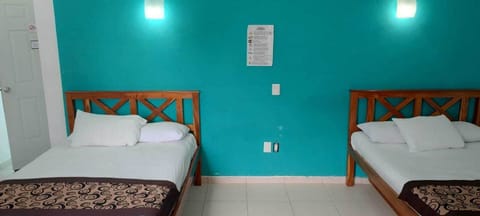Family Room | Desk, laptop workspace, WiFi (free), bed sheets