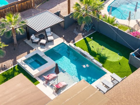 Newly remodeled yard November 2025! New pergola and putt putt green!