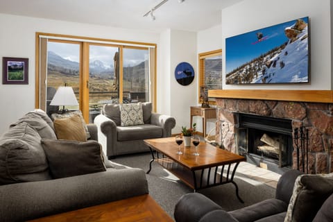 Living Room with Wood Burning Fireplace