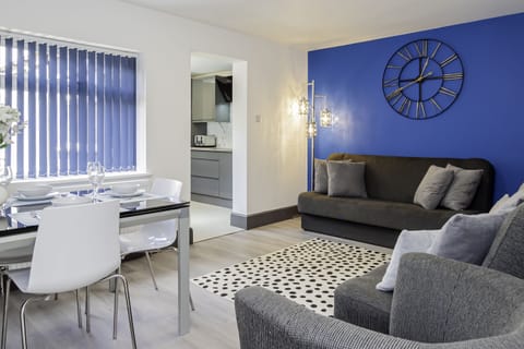 Openly connected living and dining room for gatherings and for creating a dynamic and inviting atmosphere.