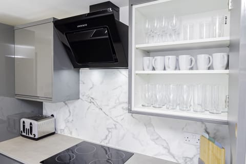 Set of glasses for a variety of drinks you might have in your list during your stay and a toaster perfect for a delicious toast to start your day off right.