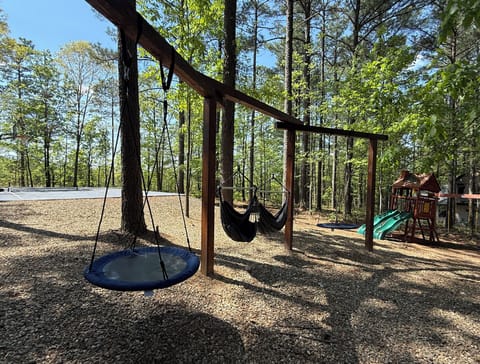 Outdoor Fun Zone: Swing into adventure with backyard hammocks and playground delights!
