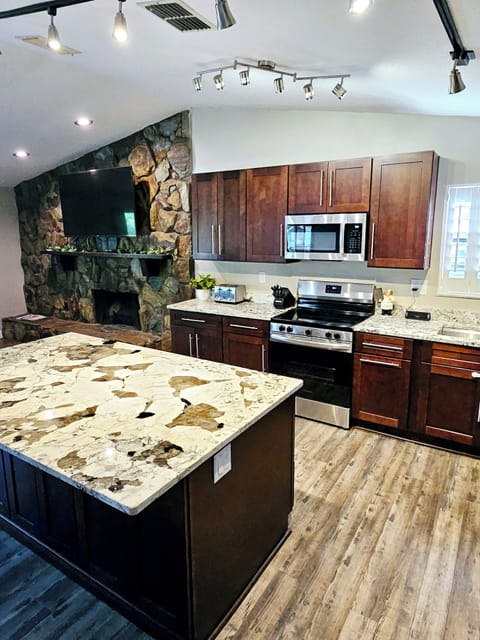 Large kitchen and Island for Eating and Prepping food