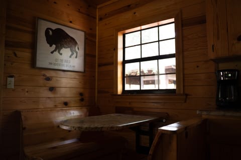 The morning light gently wakes up this booth setting off the kitchen, letting you wake up gently too.