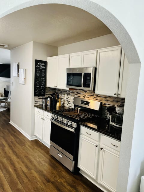 Kitchen (Pots, Coffeemaker, Blender, Utensils, & Cookware Downstairs)