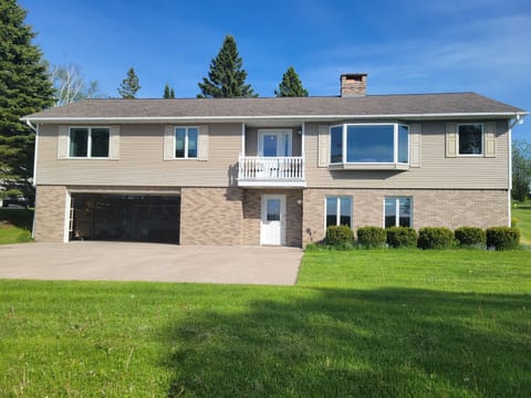 Front of house with parking pad