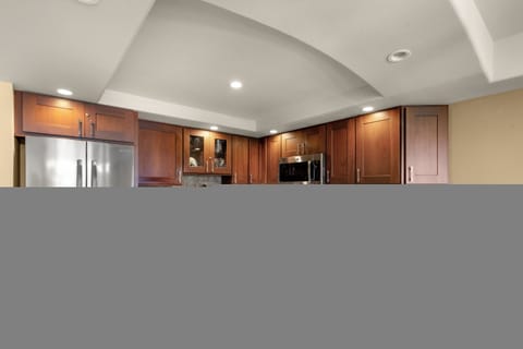 Your fully equipped gourmet kitchen features granite countertops and premium appliances, perfect for preparing memorable meals during your stay.