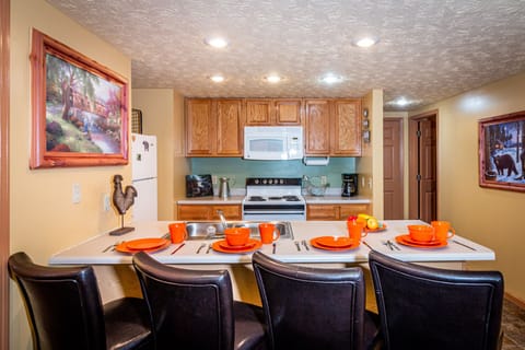 Creekside Cabin, 2 Bedrooms, Outdoor Hot Tub, Pool Table (2 King Beds, 1 Queen Sofa Bed) | Private kitchen | Full-size fridge, microwave, oven, stovetop