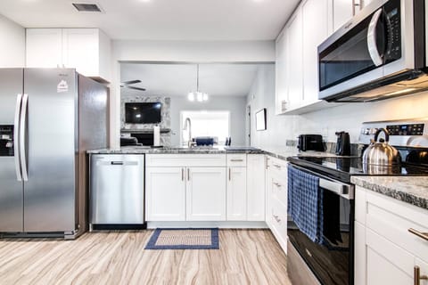 Beautiful & open concept kitchen with new stainless appliances!
