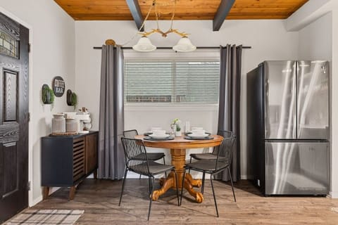 Enjoy a homecooked meal or family board game session at the comfortable dining table that`s open to the kitchen! Seats four total.