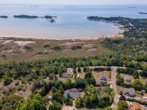 Nestled in the enchanting South Bruce Peninsula, Howdenvale Haven is not just a home but a storied sanctuary brimming with family history and local craftsmanship.