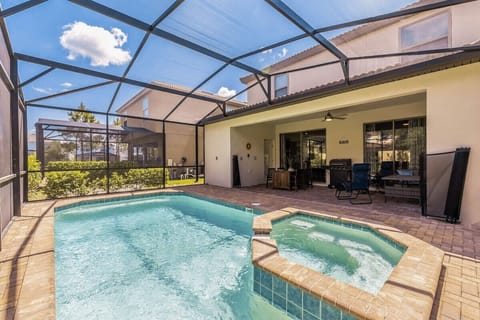 A beautiful private pool out back on the screened-in lanai, complete with sun loungers.