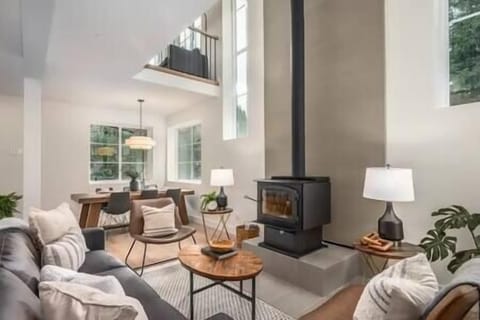 Living room with wood burning fireplace