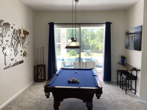 Pool table access to lanai for great entertainment