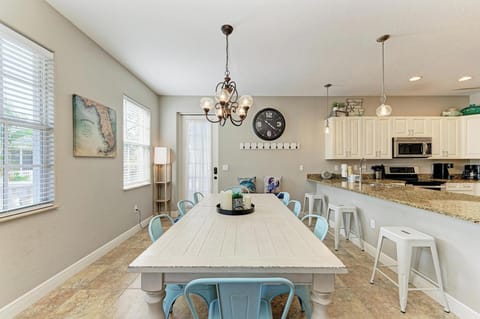 Dining room table sits just inside the front door