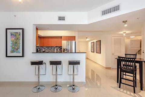 Breakfast bar and fully equipped kitchen for all your cooking needs.