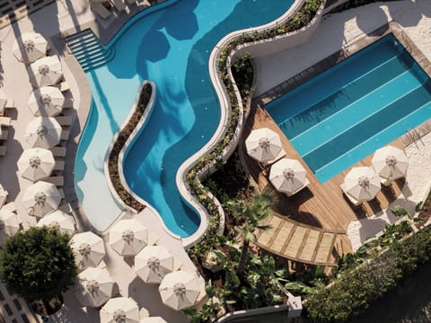 Indoor pool, 2 outdoor pools, open 7:00 AM to 8:00 PM, pool umbrellas